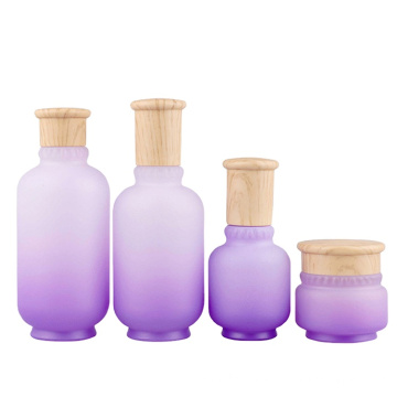 Matte purple glass bottles with wooden color cap